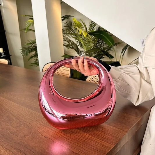 Hot Selling Creative Design Women's Top-Handle Bag PVC Metallic Luster Half Moon Banquet Women's Bag 2026 New Luxury Handbag