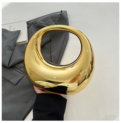 Hot Selling Creative Design Women's Top-Handle Bag PVC Metallic Luster Half Moon Banquet Women's Bag 2026 New Luxury Handbag